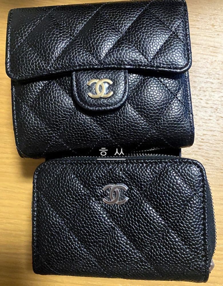 Chanel zipped wallet, black with silver hardware.