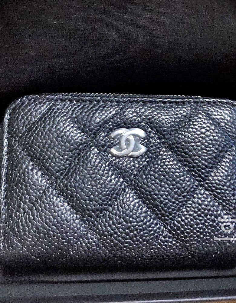 Chanel zipped wallet, black with silver hardware.