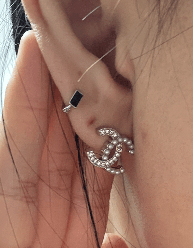 Chanel custom jewelry, earrings with a subtle twist on the classic CC design!