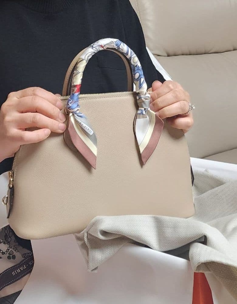 Hermès Bolide 25 in Trench color, crafted from Evercolor leather.