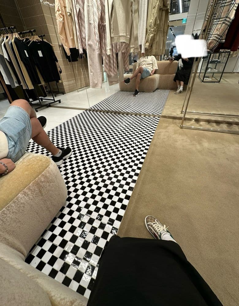 Burberry Markdown Shopping Haul: Moncler Knit, Hermès Sneakers, and Gucci Sneakers.