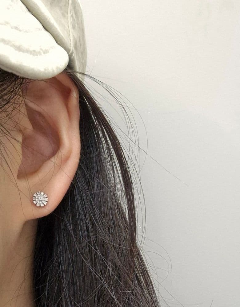 Damiani earrings, full diamonds.