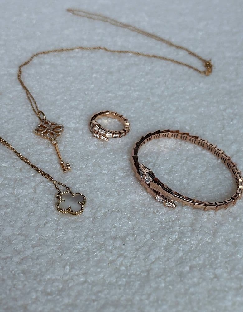 Bulgari Serpenti ring (full pavé) and bracelet (demi-pavé)