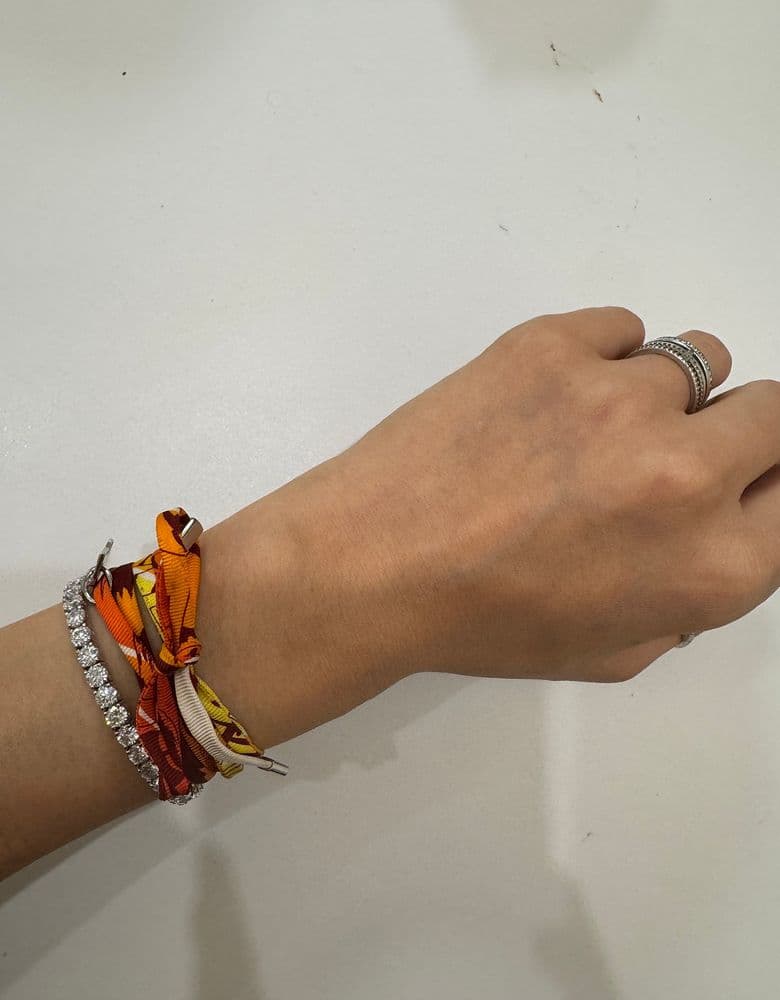 Loving my Bauschl tennis bracelet! It looks so good layered with my Kelly bracelet and Rolex.