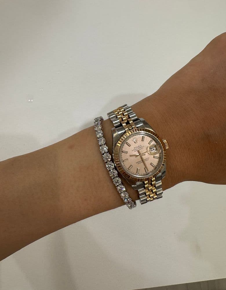 Loving my Bauschl tennis bracelet! It looks so good layered with my Kelly bracelet and Rolex.