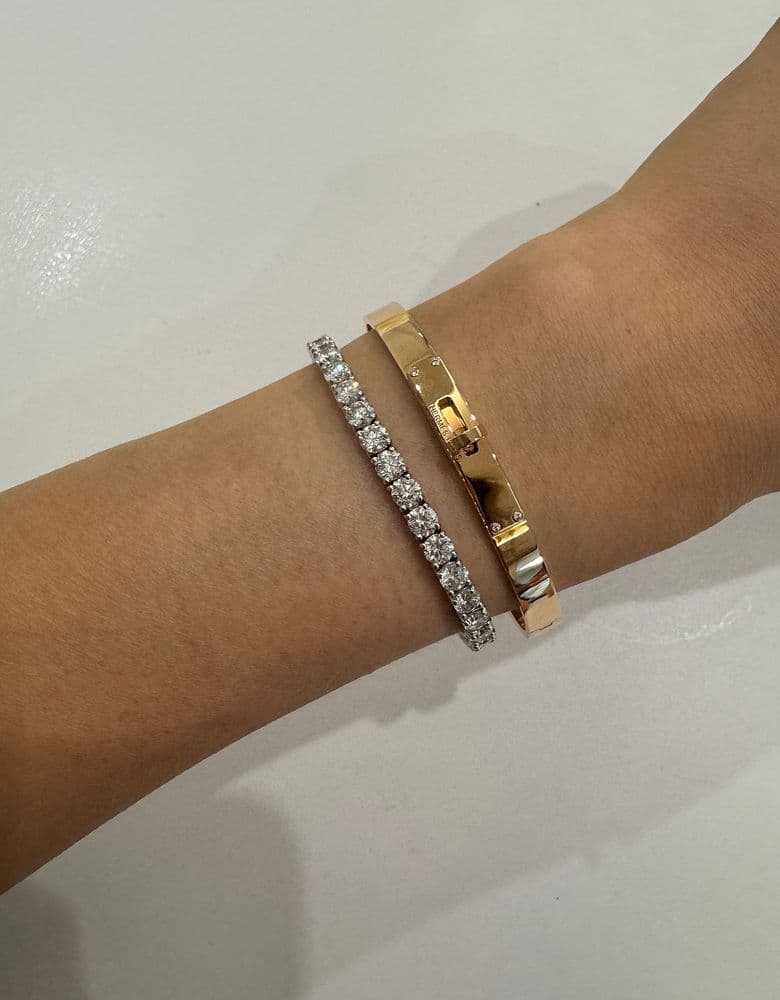 Loving my Bauschl tennis bracelet! It looks so good layered with my Kelly bracelet and Rolex.