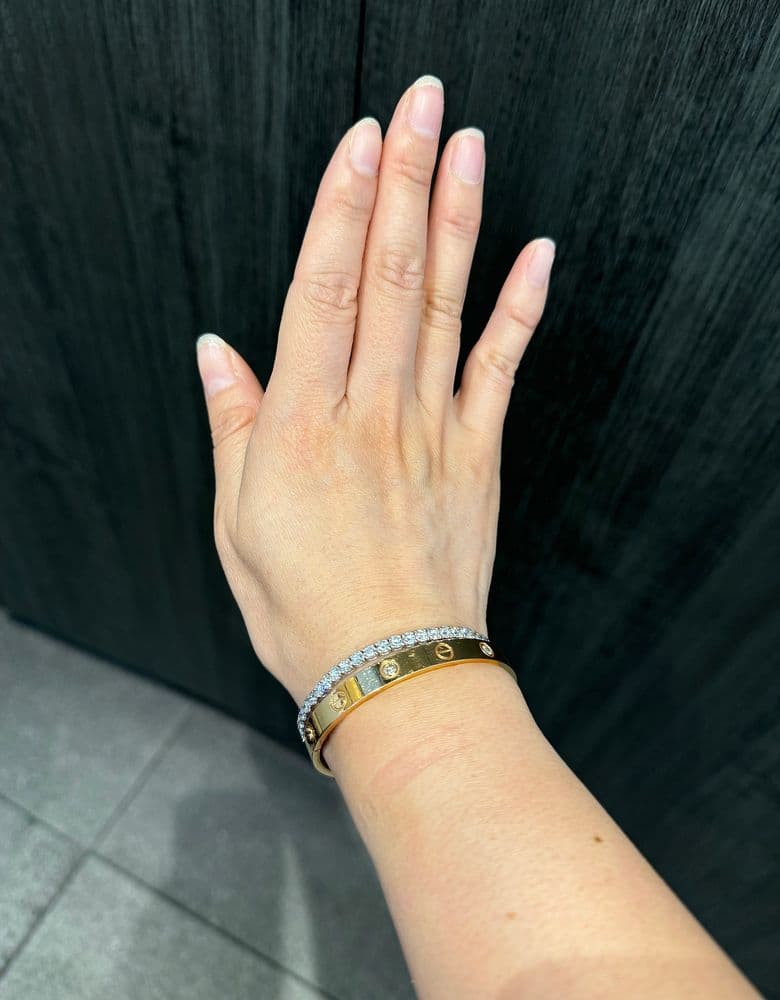 Lab-grown diamond ring and tennis bracelet.