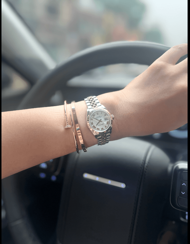 Hermès ring, Cartier Ecrou bracelet - my everyday essentials.