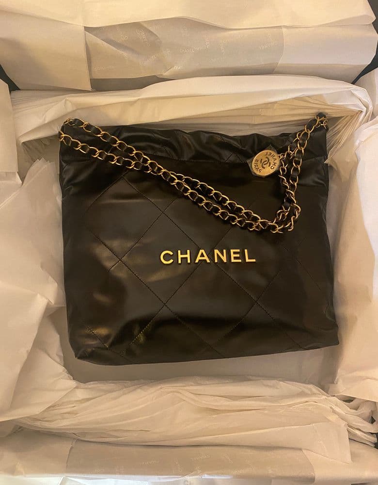 My one-year review of the Chanel 22 bag in black with gold hardware (small size).