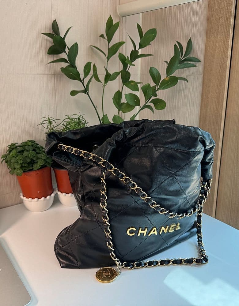 My one-year review of the Chanel 22 bag in black with gold hardware (small size).