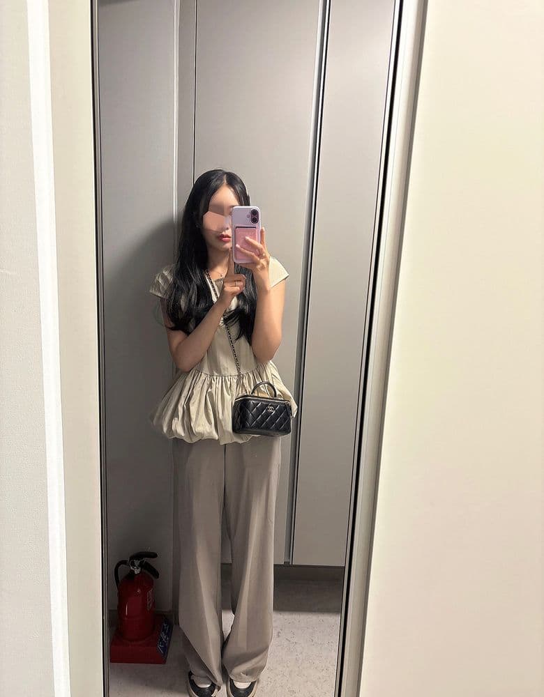 Chanel vanity bag, modeled.