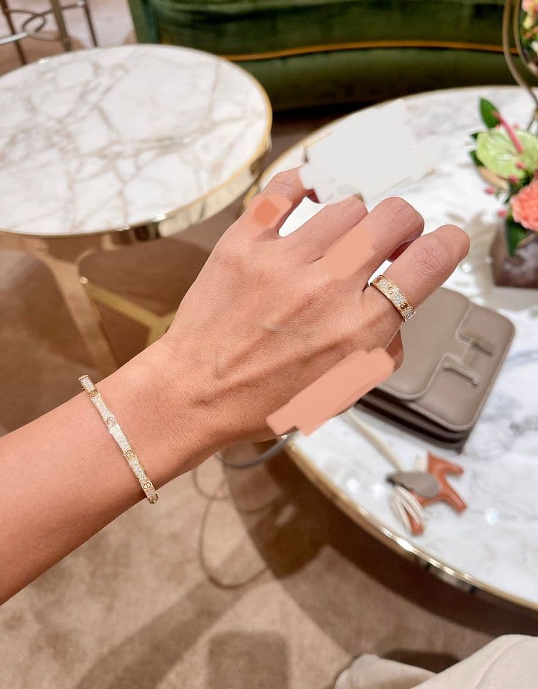 Cartier LOVE Ring, paved, small model; Juste un Clou classic ring, half-paved.