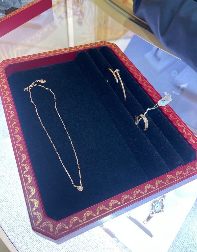 Cartier LOVE Ring, paved, small model; Juste un Clou classic ring, half-paved.