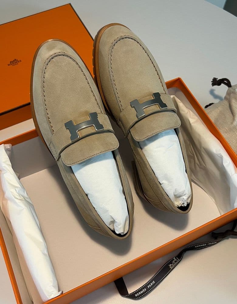 Hermès Faubourg loafers in beige.