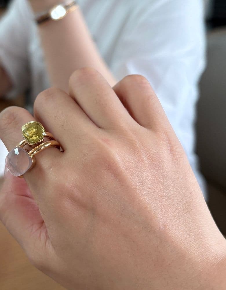 Pomellato Nudo rings in rose quartz and lemon quartz.