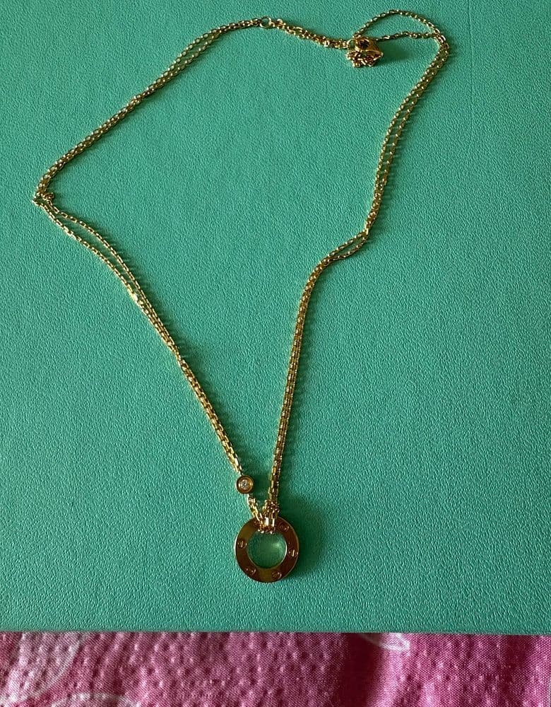 Cartier LOVE Pendant Necklace with 2 Diamonds in Yellow Gold