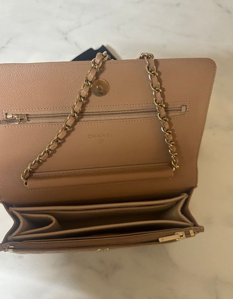 Chanel WOC (Wallet On Chain) in light beige, classic caviar leather.