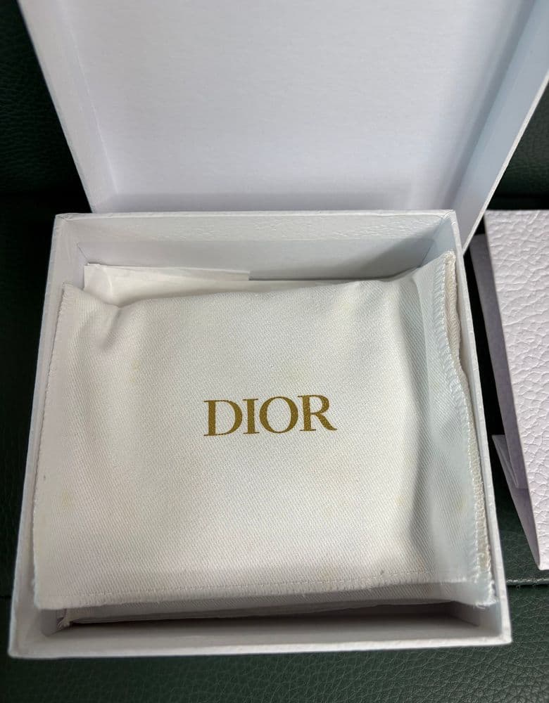 Dior Cannage calfskin card holder with charm detail