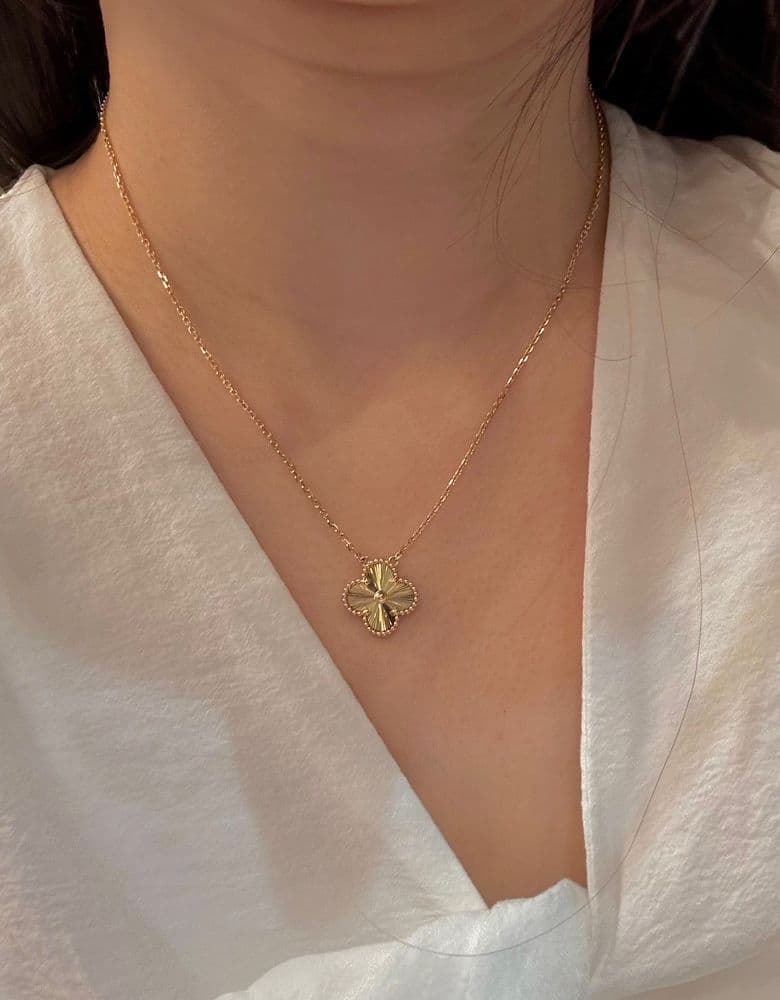 My Van Cleef Guilloché Yellow Gold Necklace: A Review