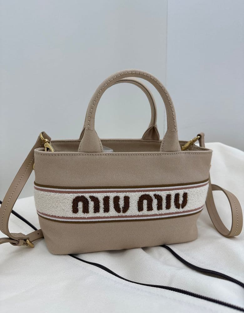 Dior totes, Boston bags, and bags from Celine, Miu Miu, and Bulgari.