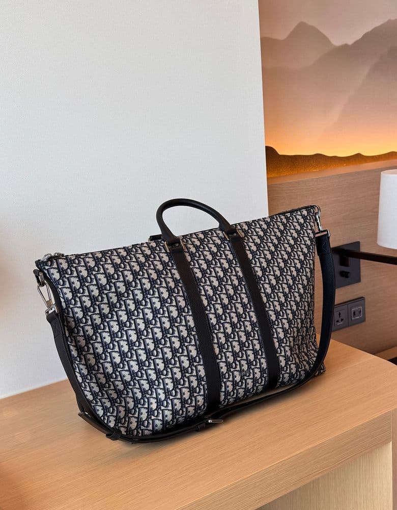 Dior totes, Boston bags, and bags from Celine, Miu Miu, and Bulgari.