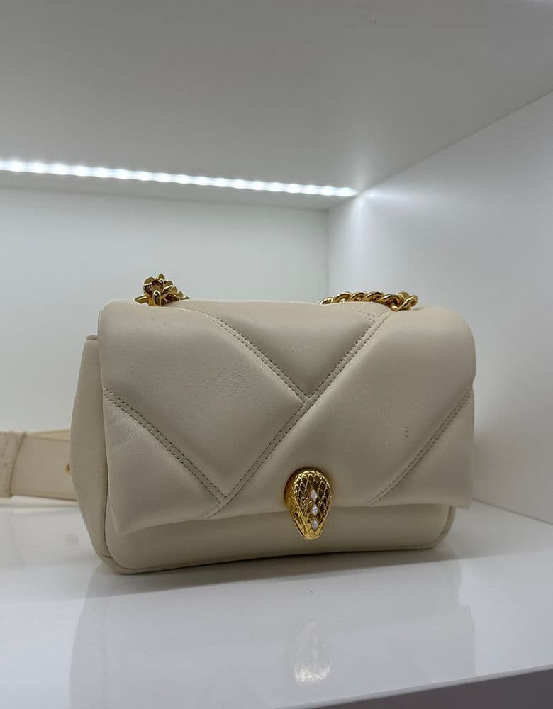 Dior totes, Boston bags, and bags from Celine, Miu Miu, and Bulgari.