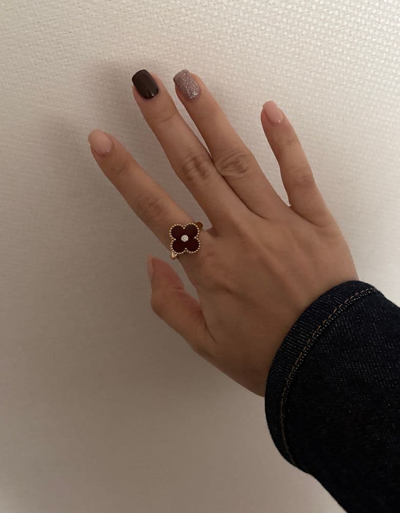 Van Cleef Vintage Alhambra Carnelian Ring (Onyx included as a bonus).