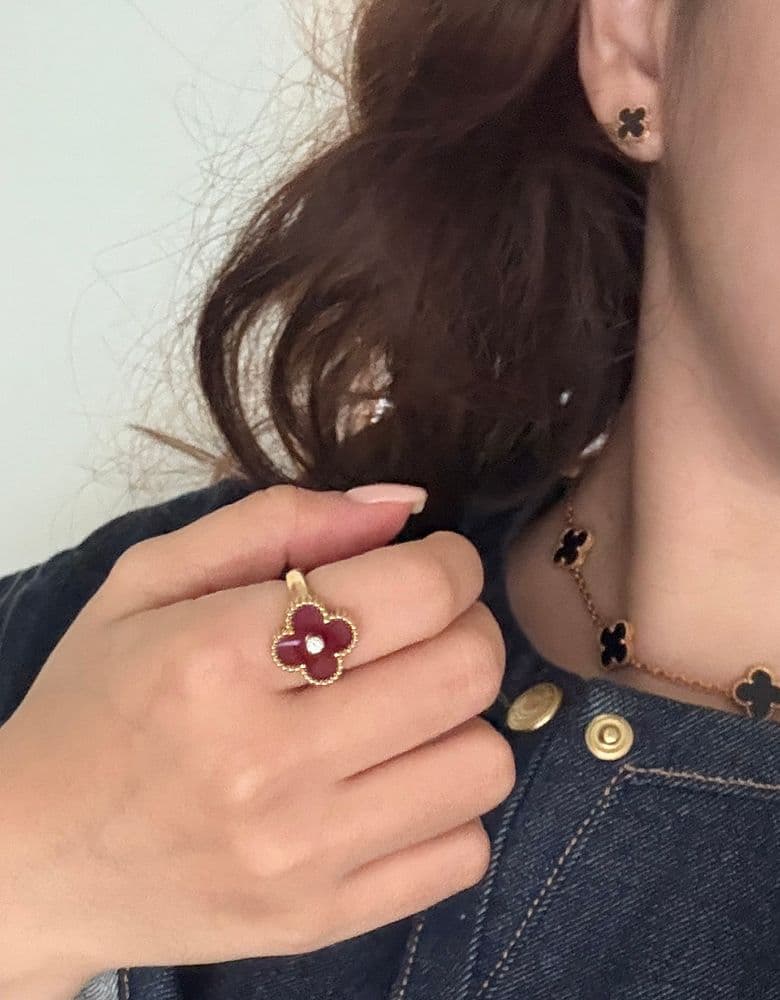 Van Cleef Vintage Alhambra Carnelian Ring (Onyx included as a bonus).