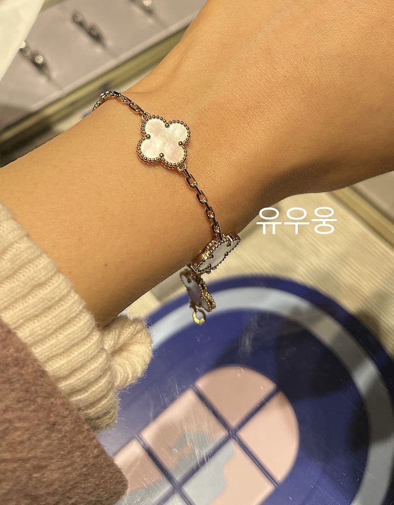 Van Cleef & Arpels Mother-of-Pearl Vintage Alhambra Necklace and 5 Motif Bracelet.