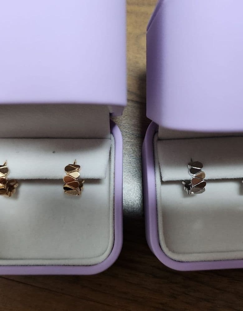 The ultimate trinity of luxury hoop earrings.