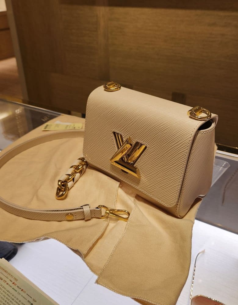 Louis Vuitton Twist PM in White