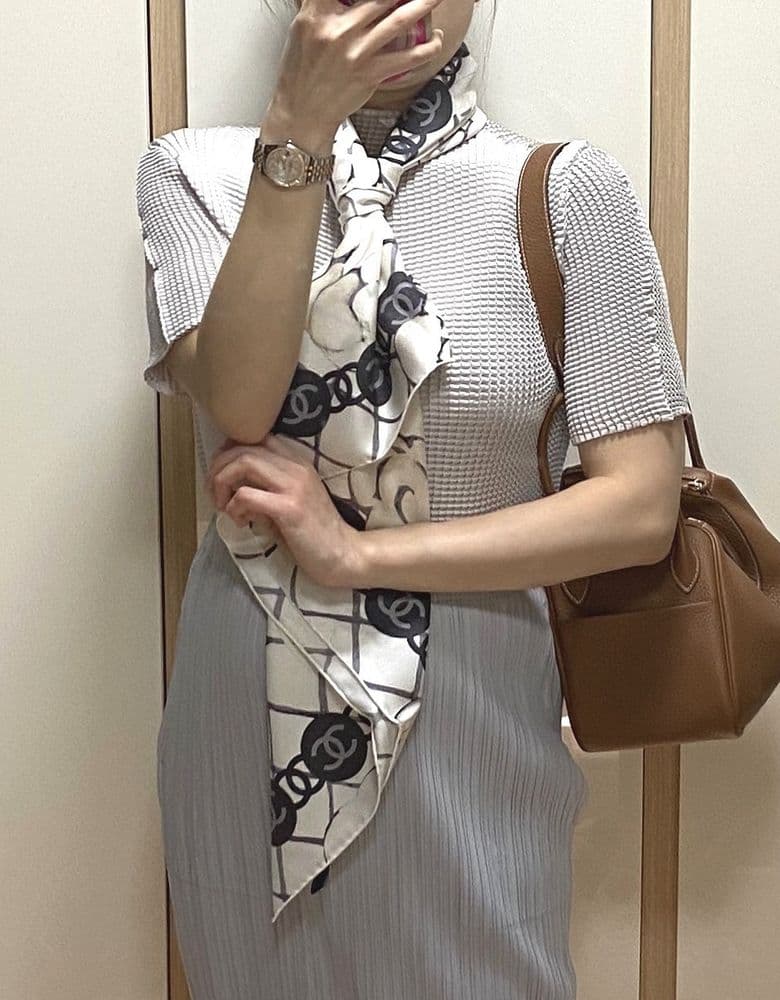 Chanel Camellia scarf, Vanity mini bag, and more.