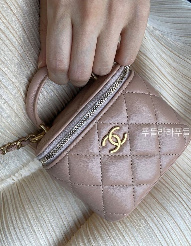 Chanel Camellia scarf, Vanity mini bag, and more.