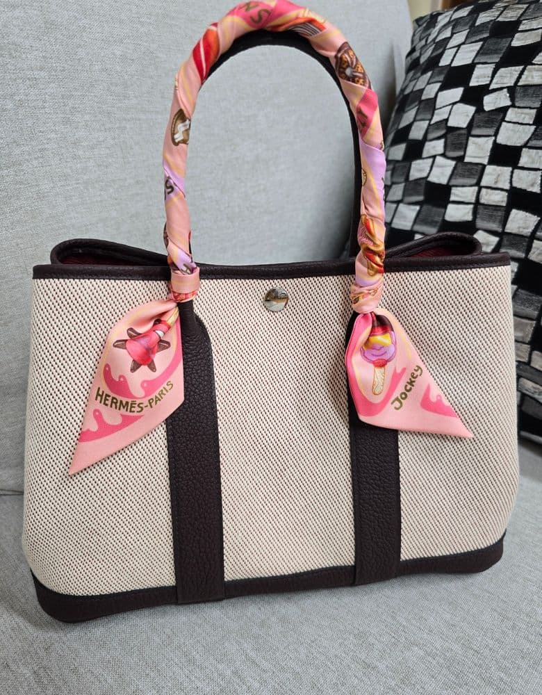 Hermès Garden Party 30 bag in canvas and Negonda leather with palladium hardware, Beton/Noir