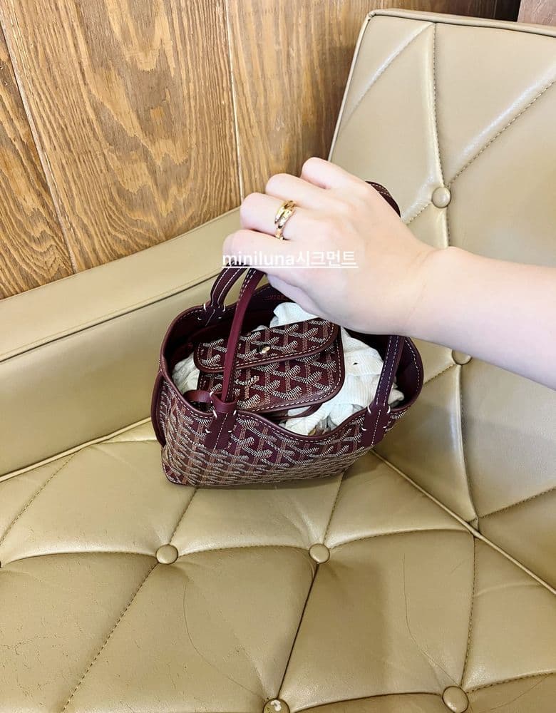 Chanel Tambourine Bag (round bag) + Celine Scrunchie, and a Bulgari Serpenti Ring.