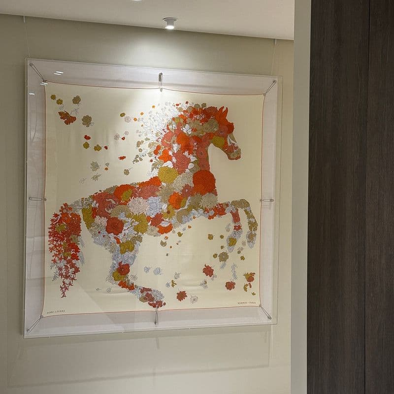 A peek into a luxurious interior, styled with Hermès scarves and tableware!