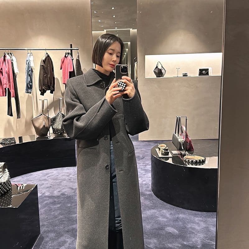 Styling with Khaite: Where classic meets contemporary.