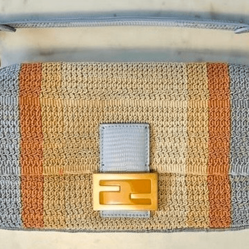 Fendi caves to China? Korean knot bag removed.