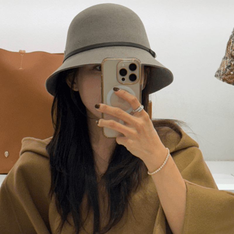 Reviewing Helen Kaminski's winter hats and cape coats: A hat lover's haven.